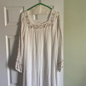 Cotton dress and is lined s not see thru.  Embroidery is perfect. So pretty!